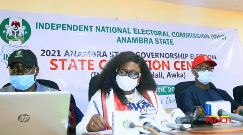 INEC office for results collation2 (From the left) Unnamed official, State Collation/Returning officer for the Anambra State governorship election, Prof Florence Obi and the Resident Electoral Commissioner in Anambra State, Nkwachukwu Orji. Photo: Saheed Olugbon